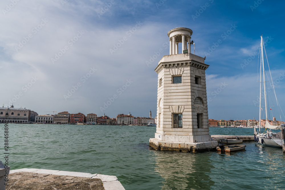 Lighthouse at the exit of the Marina in Venice