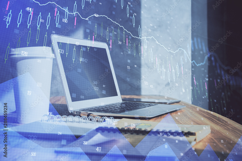 Financial market graph hologram and personal computer on background. Multi exposure. Concept of forex. Financial market graph hologram and personal computer on background. Multi exposure. Concept of forex.