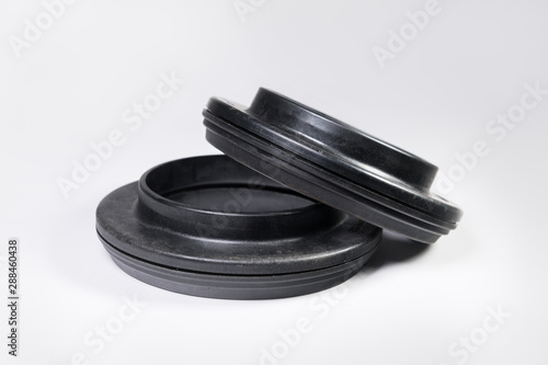 A pair of new thrust bearings absorber car on a gray background. The concept of new car parts and car service