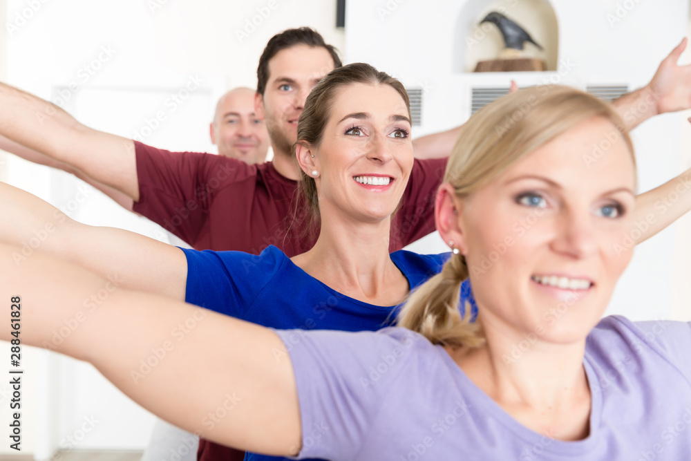 Fototapeta premium People practicing yoga lesson