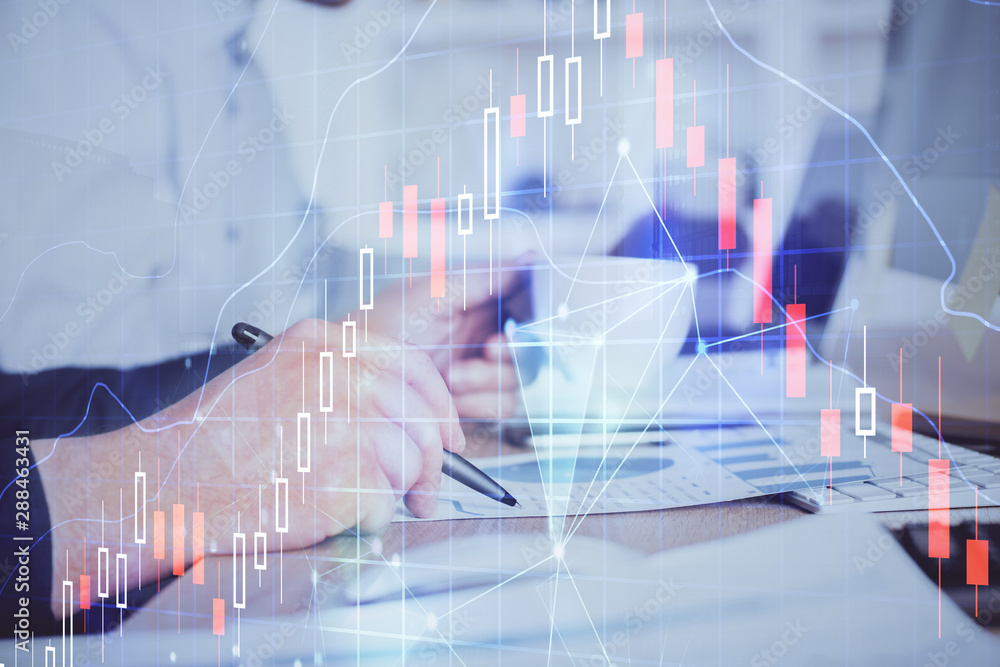 Double exposure hands with stock market chart. Double exposure hands with stock market chart.