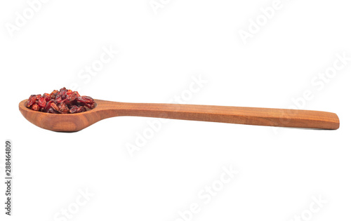 Dry barberry in spoon