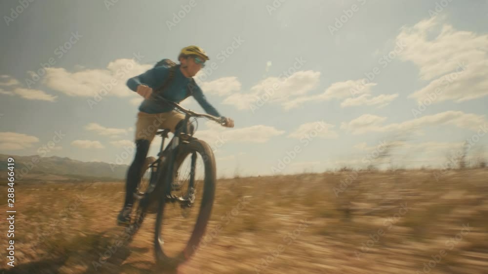 A guy cycling and having fun on his E-bike A guy cycling and having fun on his E-bike