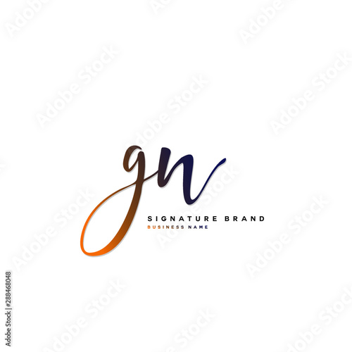 G N GN Initial letter handwriting and  signature logo concept design. photo