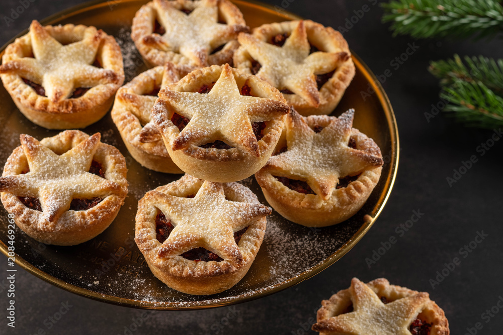 British Christmas mince pies on dark background. British Christmas mince pies on dark background.