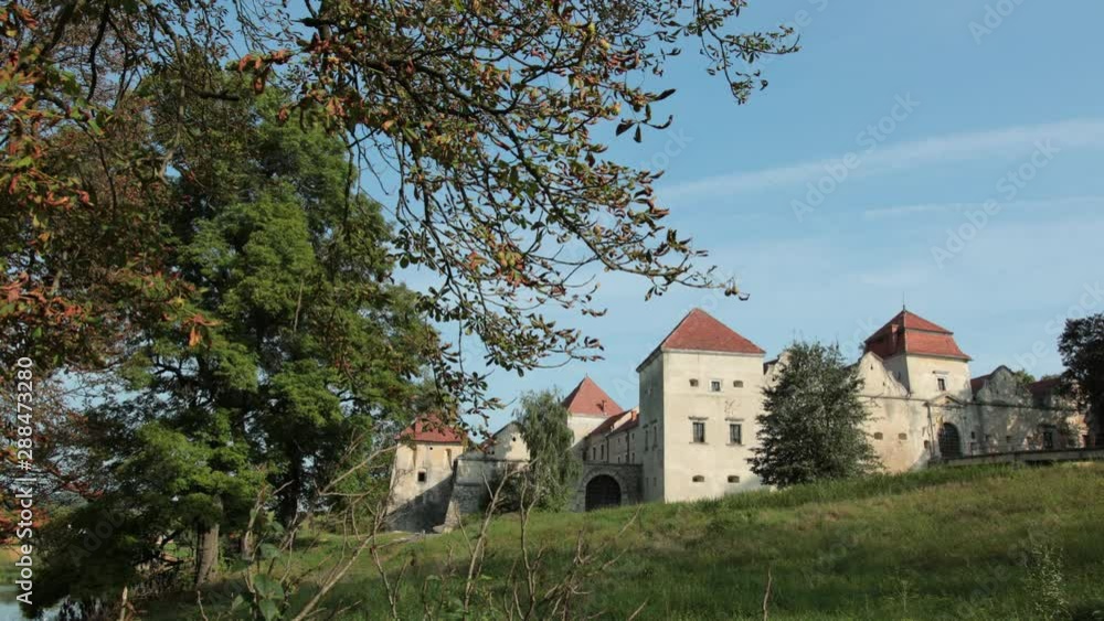 antique castle with red roof, old gate, good weather antique castle with red roof, old gate, good weather