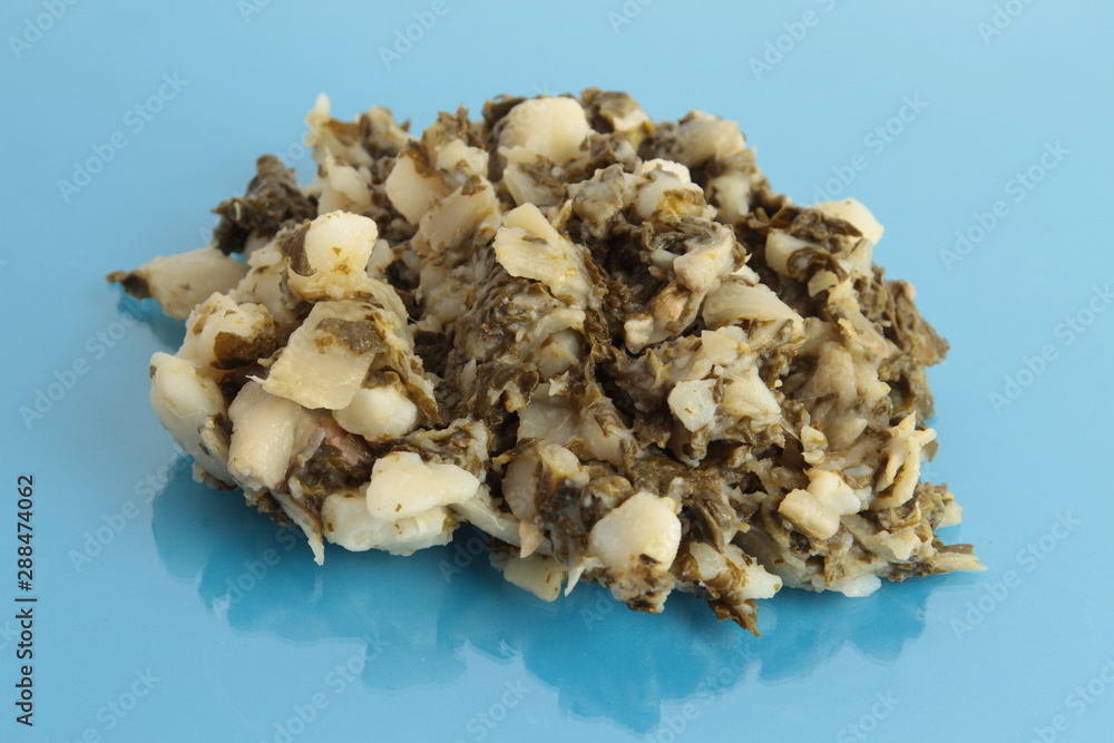 delicious chard with potato on bluebackground delicious chard with potato on bluebackground