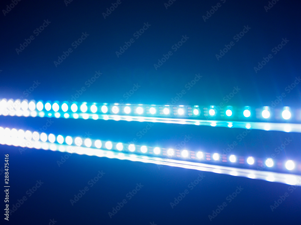 close up on blue LED light in black background