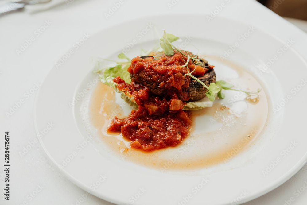 close up on stuffed baked mushroom, portabello close up on stuffed baked mushroom, portabello
