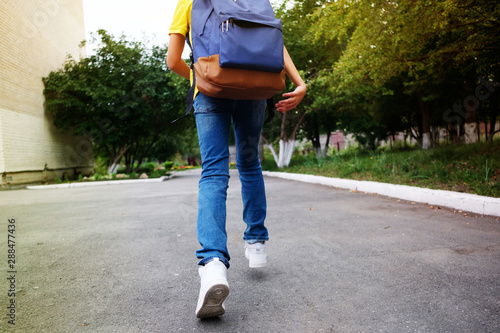 Schoolboy runs to school