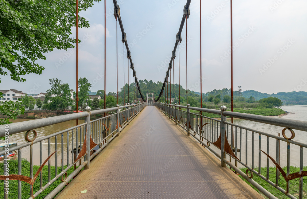 Iron rope suspension bridge in the ancient town of Huanglongxi, Chengdu, Sichuan Province, China