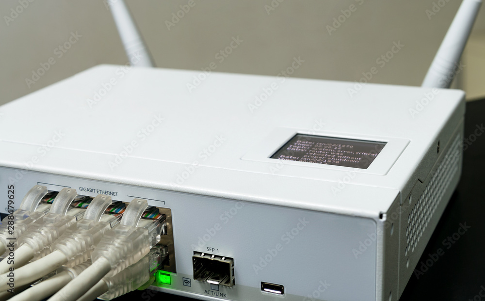 Switched-on enterprise gigabit router closeup. Switched-on enterprise gigabit router closeup.