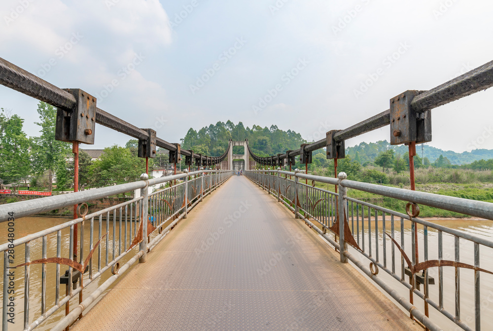 Iron rope suspension bridge in the ancient town of Huanglongxi, Chengdu, Sichuan Province, China