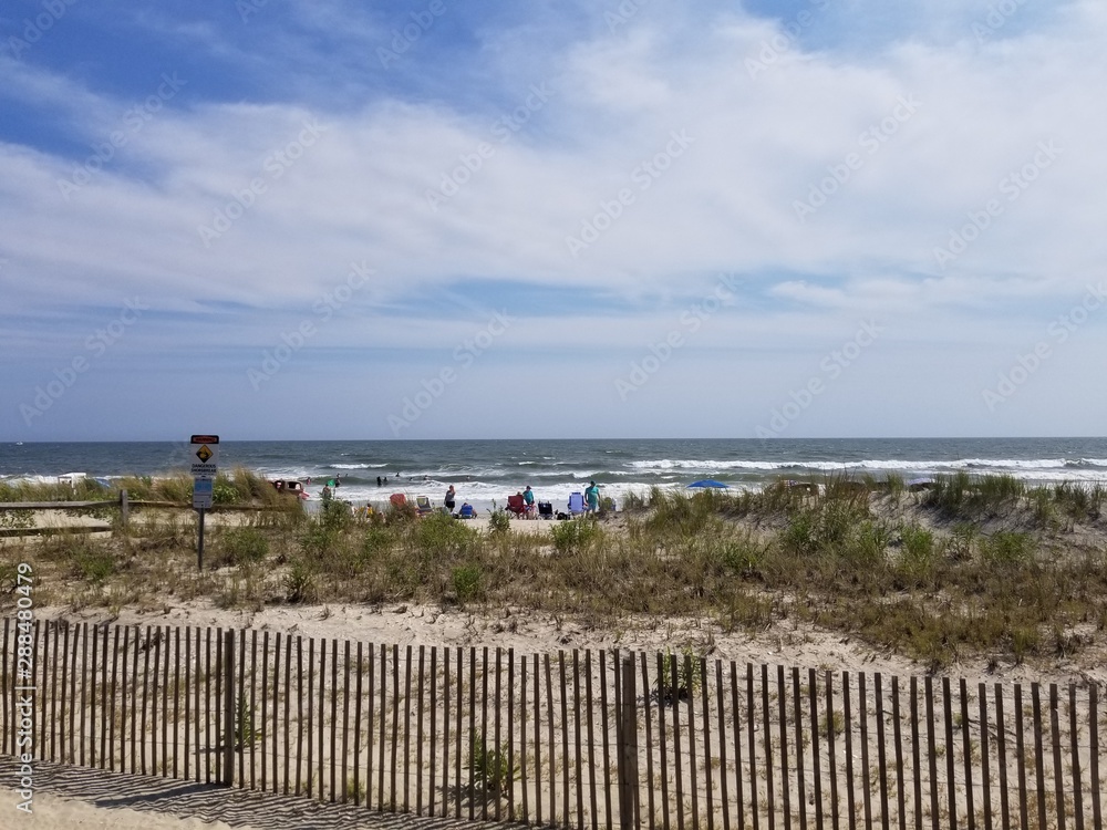 beach with blue sky and clouds beach with blue sky and clouds