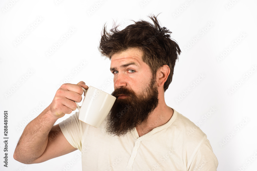 Morning with coffee or milk. Man with cup of coffee. Bearded man with mug in hand. Morning coffee concept. Businessman drinking coffee. Good morning. Handsome bearded man drinking cup of hot beverage. Morning with coffee or milk. Man with cup of coffee. Bearded man with mug in hand. Morning coffee concept. Businessman drinking coffee. Good morning. Handsome bearded man drinking cup of hot beverage.