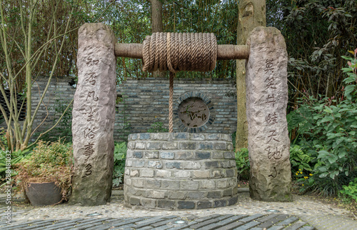 An ancient well and well rope, Huanglongxi ancient town in Chengdu, Sichuan Province, China photo