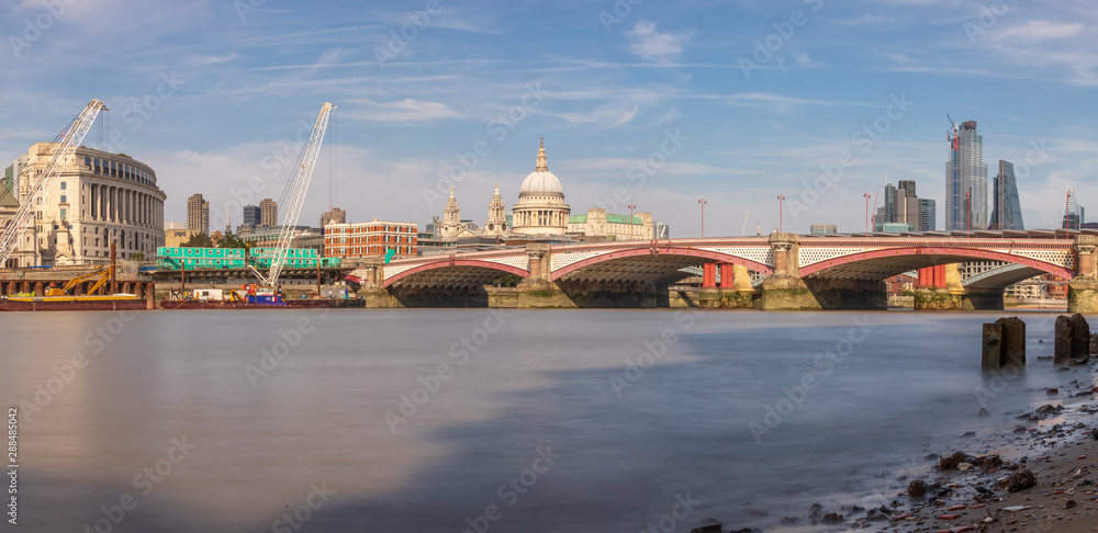 London, UK - View of the River Thames, Blackfriars Bridge, Saint Paul's Cathedral and London Skyscrapers