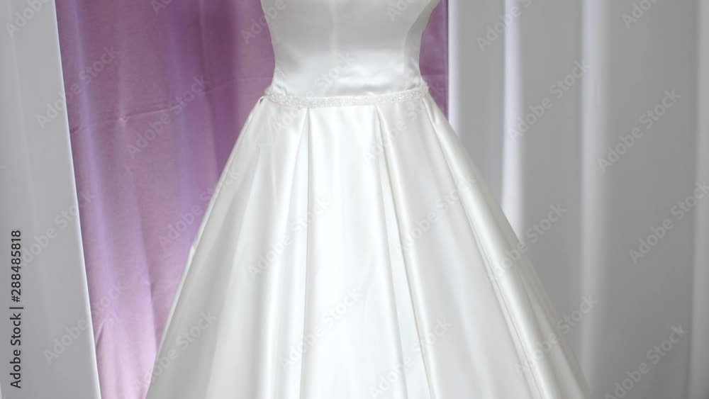 wedding dress dressed on a mannequin in a bridal salon wedding dress dressed on a mannequin in a bridal salon