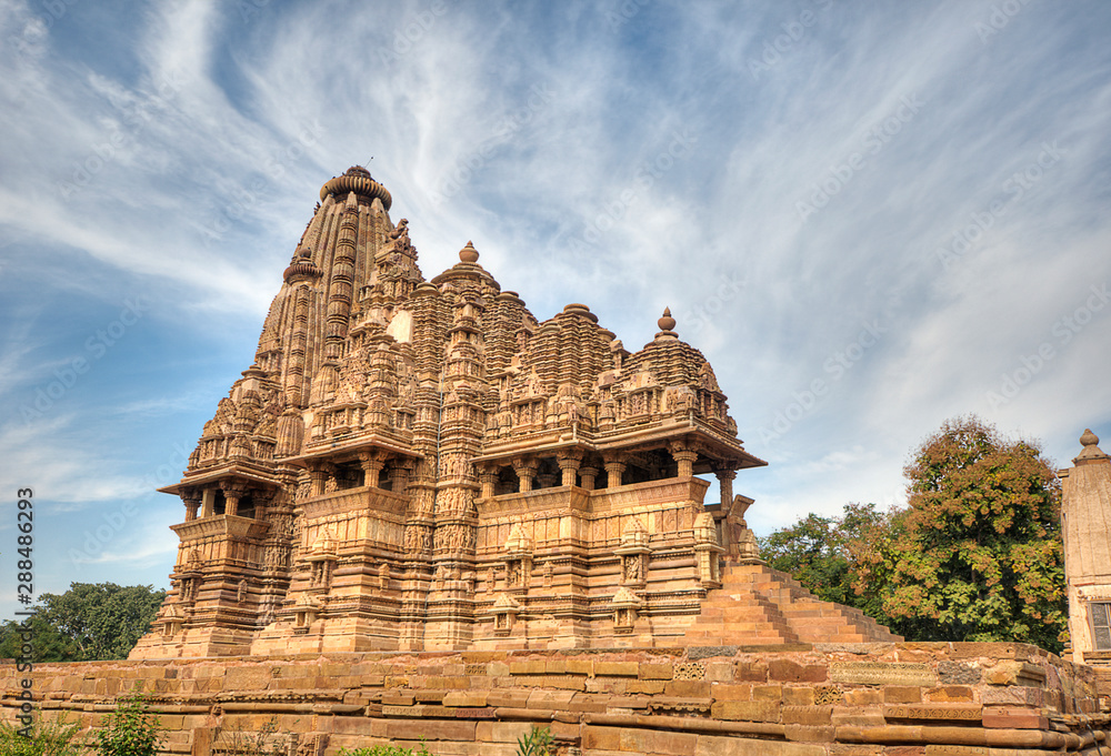 The Vishvanatha Temple is a Hindu temple in Madhya Pradesh, India. It is located among the western group of Khajuraho Monuments, a UNESCO World Heritage site. The temple is dedicated to Shiva, The Vishvanatha Temple is a Hindu temple in Madhya Pradesh, India. It is located among the western group of Khajuraho Monuments, a UNESCO World Heritage site. The temple is dedicated to Shiva,