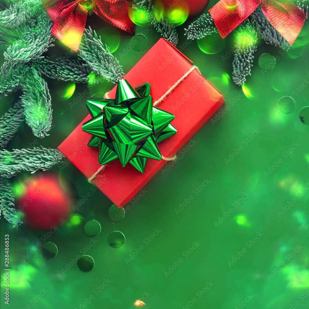 Christmas composition.  Background with gift box and decorations.