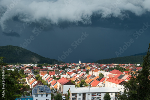 Summer storm clouds over the town of Delnice in Gorski kotar, Croatia, panorama