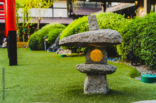 Classic Jpanese garden stone lantern photo