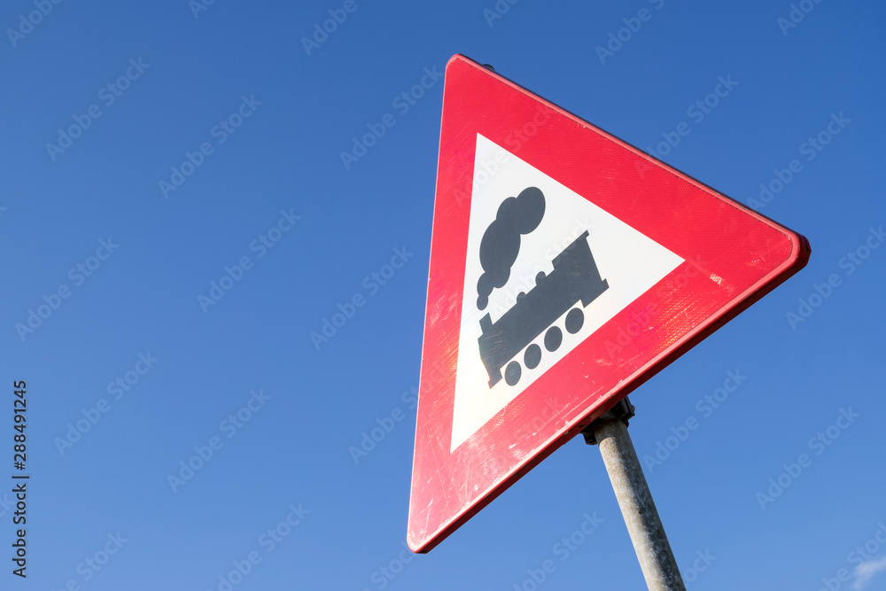 Dutch road sign: level crossing without barrier or gates ahead Dutch road sign: level crossing without barrier or gates ahead