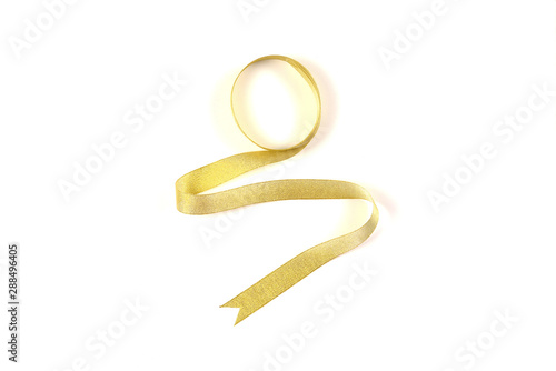 Golden ribbon isolated on white background.