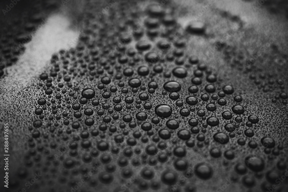 Closeup black car paint surface with 
