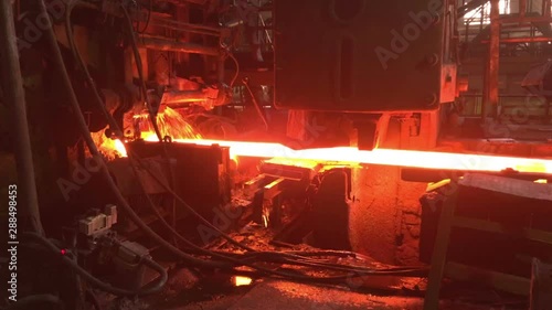 hot metal is pushed out of a metallurgical furnace, metal production, metallurgy, rolling mill