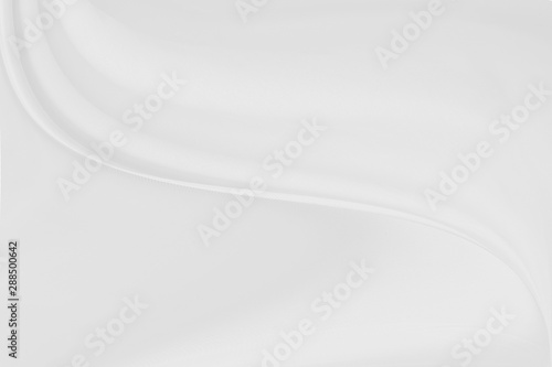 Closeup elegant crumpled of white silk fabric cloth background and texture. Luxury background design.-Image. © Dilok