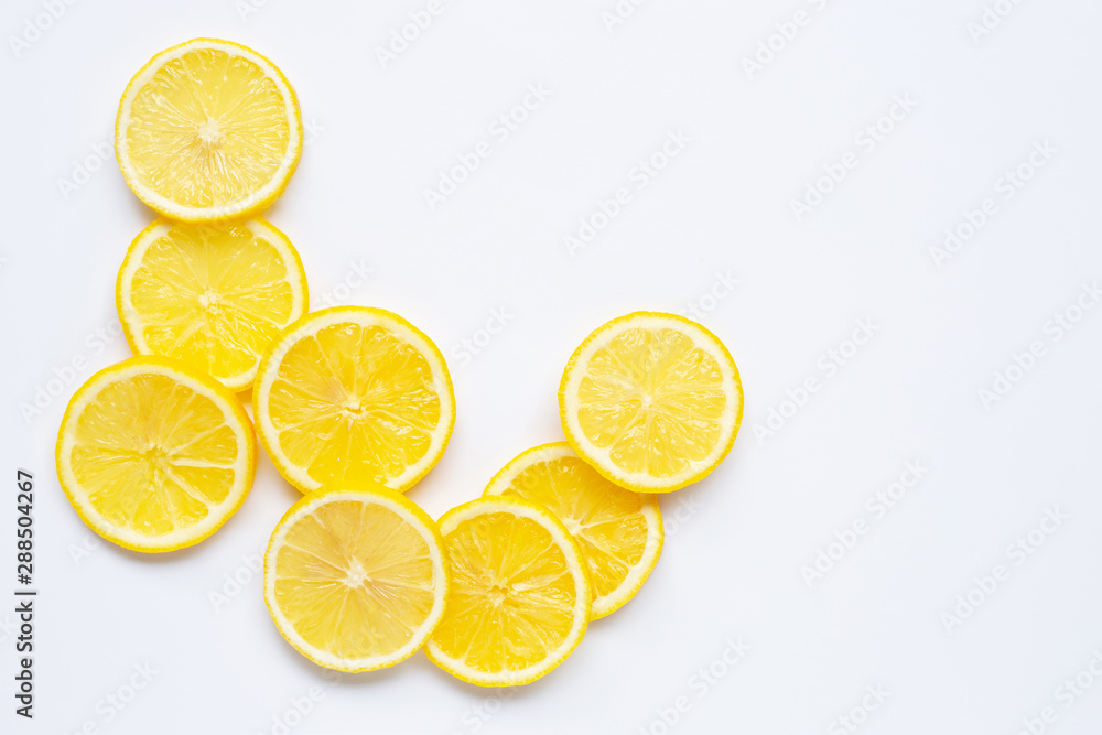 Fresh lemon slices on white background.