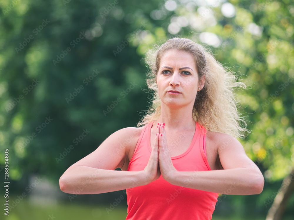 Woman Doing Yoga in the Park Woman Doing Yoga in the Park