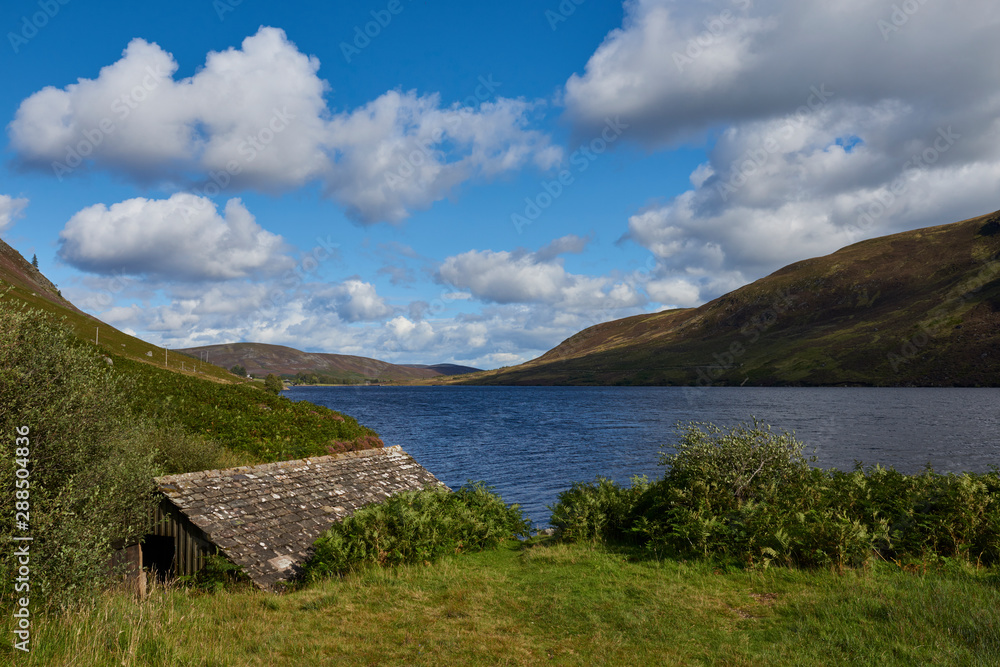 An abandoned and hidden Boathouse on the sides of Loch Lee lies hidden within the Bracken and vegetation, high up in the Angus Glens of Scotland.