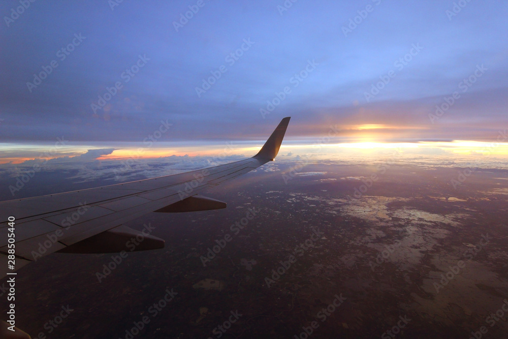 aircraft wing flying over beautiful clouds aircraft wing flying over beautiful clouds