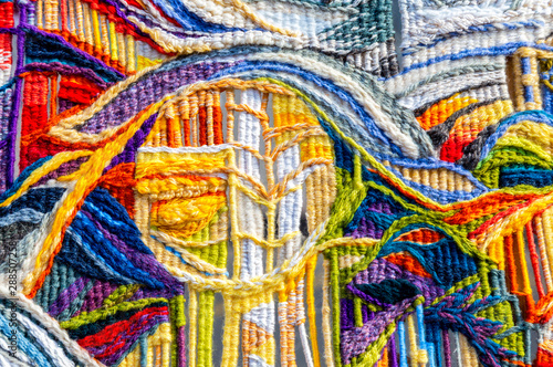 Woolen multicolored threads texture as background