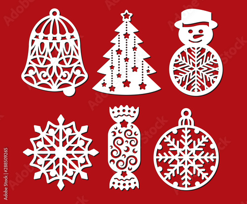 Set of Christmas decoration: bell, xmas tree, snowman, snowflake, candy, ball. Template for laser cutting, wood carving. Vector silhouette on red background. Cutout openwork toy with a lace ornament.