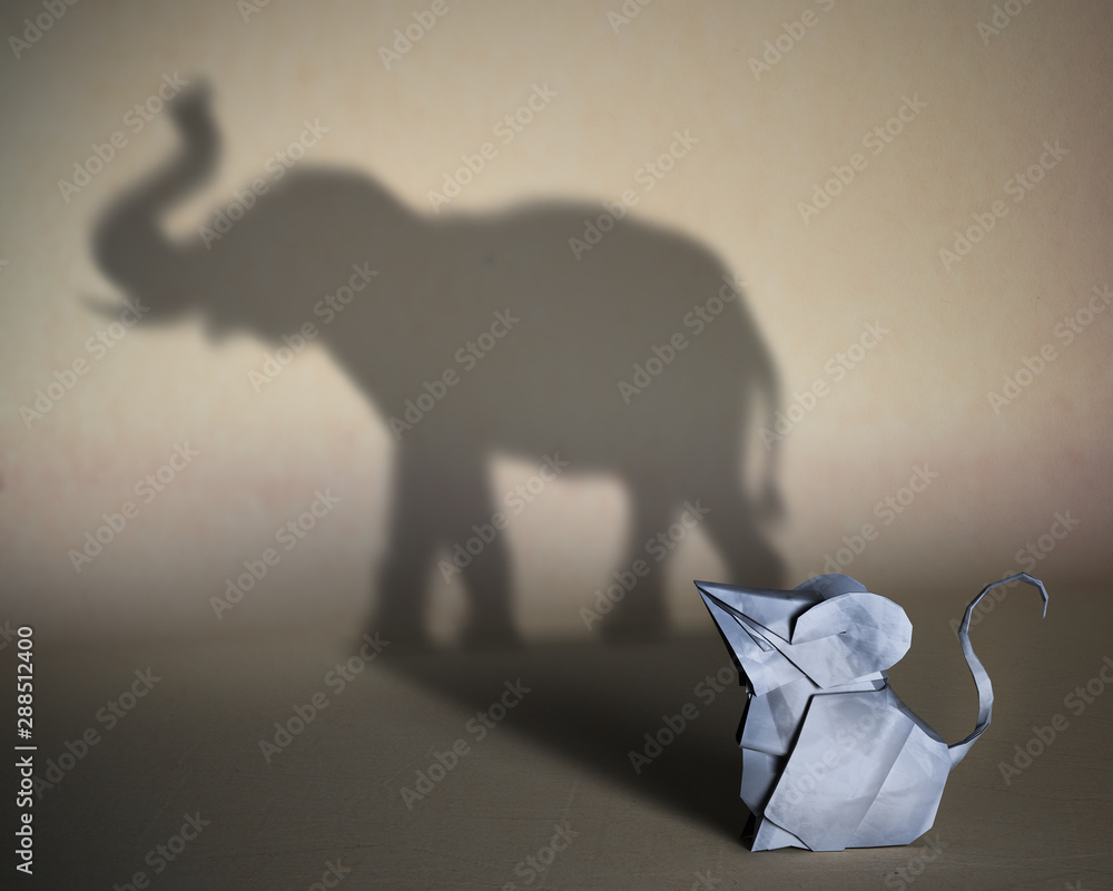 Concept of hidden potential. A paper figure of a mouse  that fills the shadow of  an elephant. 3D illustration - obrazy, fototapety, plakaty 