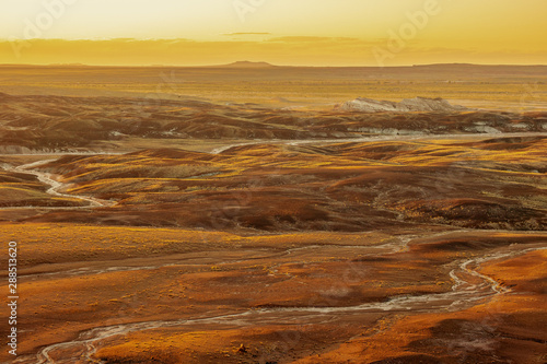 Glowing sunset landscape of Petrified Forest National Park photo