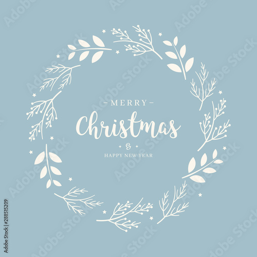 Merry Christmas greeting text branch  wreath circle blue background