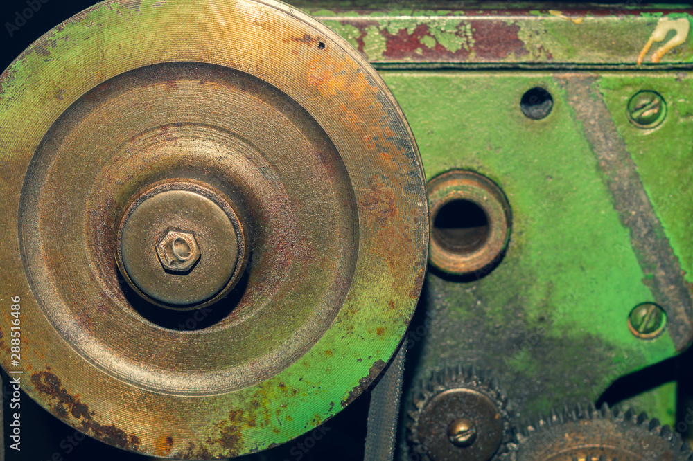 Gears of industrial machine. detail of mechanism. old cogwheels of machinery Gears of industrial machine. detail of mechanism. old cogwheels of machinery