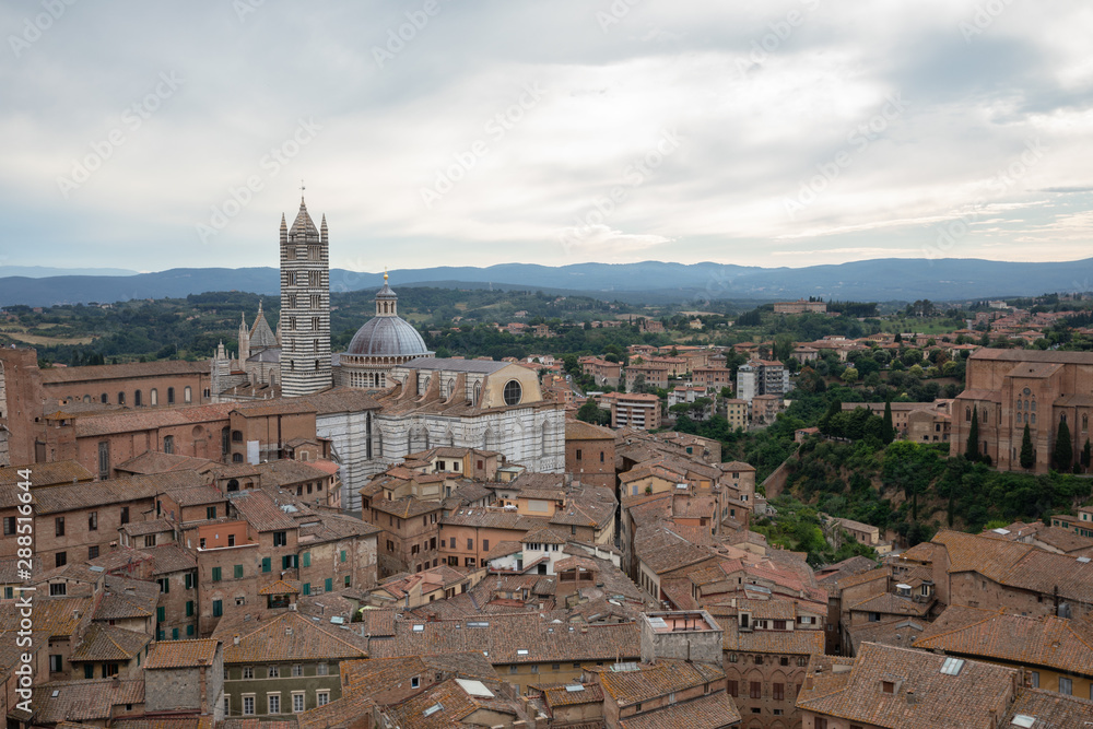 Panoramic view of Siena city with historic buildings and streets