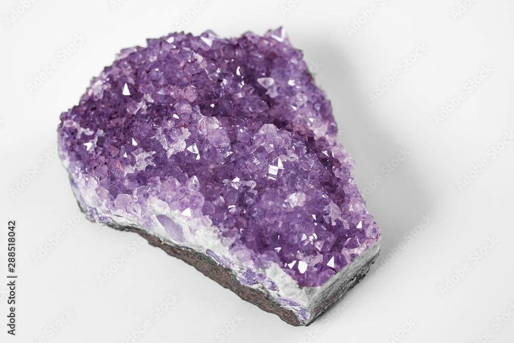 Purple amethyst on white background. Purple amethyst on white background.
