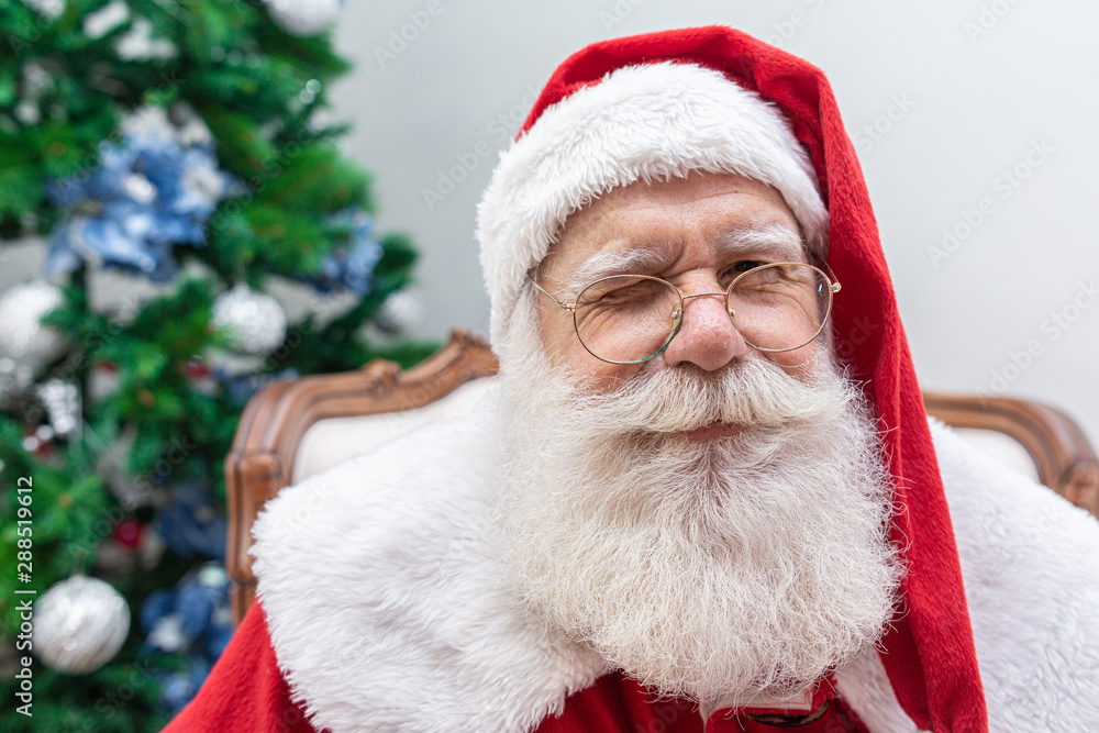Santa Claus looking at the camera. Christmas is coming. Merry Christmas. Santa is watching Santa Claus looking at the camera. Christmas is coming. Merry Christmas. Santa is watching