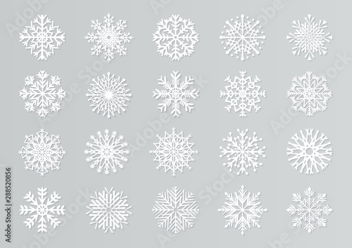 Paper cut snowflakes. White 3D Christmas design templates for decoration and greeting cards. Vector handmade isolated white paper cutout snow elements set photo