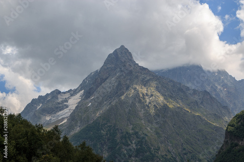 Panorama view on mountains scene in national park of Dombay, Caucasus