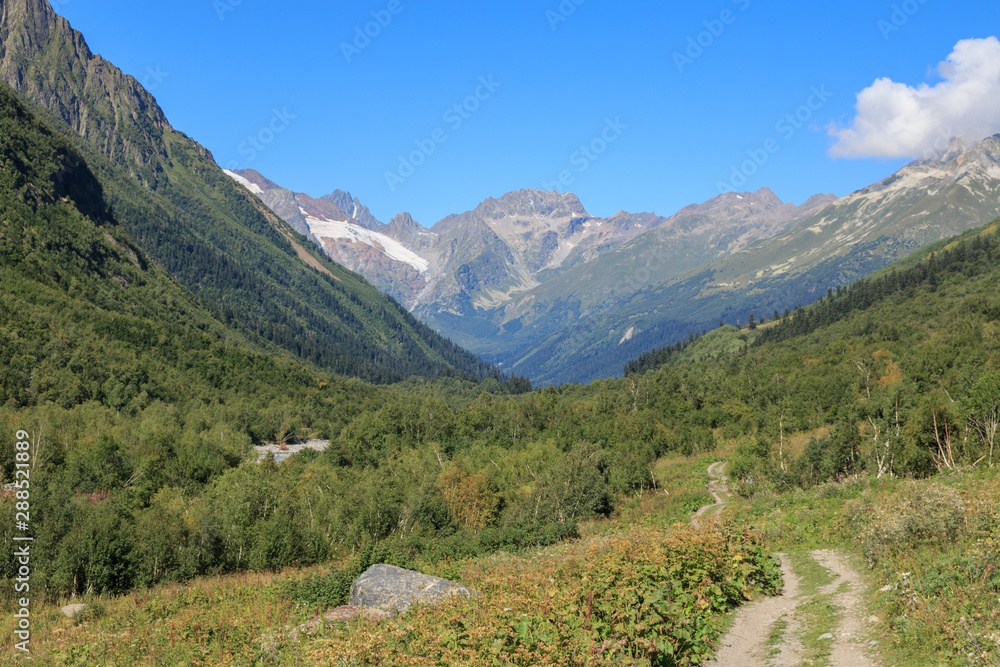 Closeup view mountains and river scenes in national park Dombay, Caucasus