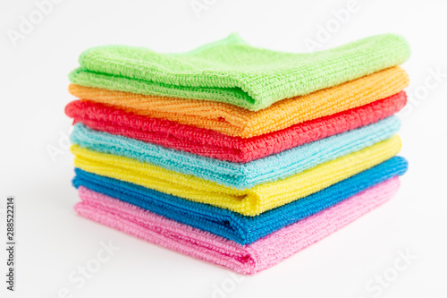 colored microfiber cloths on a white background photo