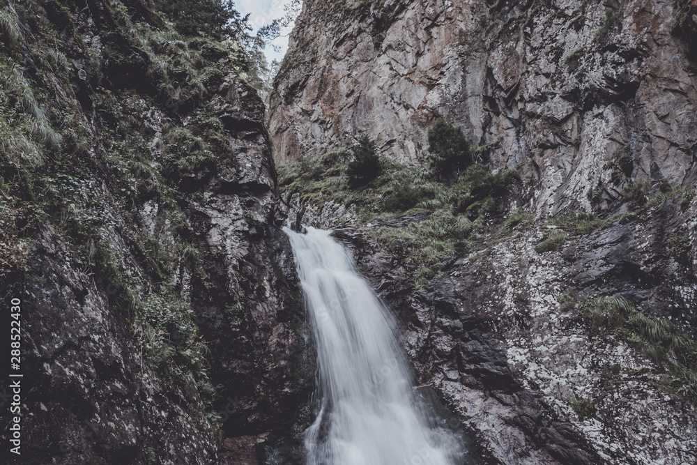 Closeup view of waterfall scenes in mountains, national park Dombay, Caucasus Closeup view of waterfall scenes in mountains, national park Dombay, Caucasus
