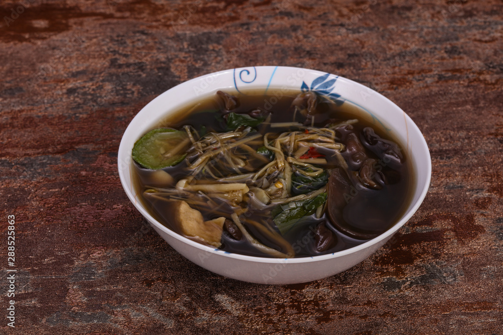 Thai style soup with meat and mushrooms Thai style soup with meat and mushrooms